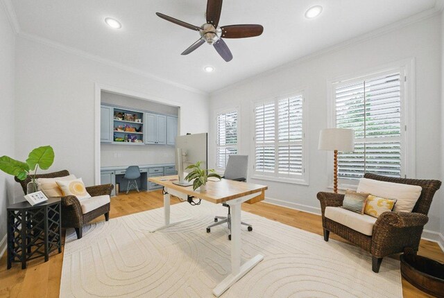 7921 W Rim Dr, Austin, TX 78731 - office area featuring crown molding, ceiling fan, light wood-style floors, and recessed lighting