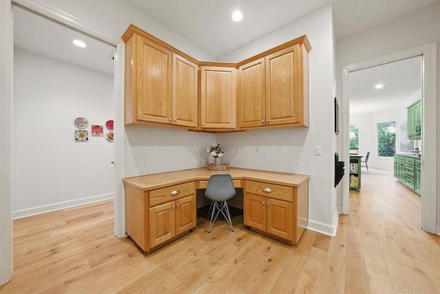 7921 W Rim Dr, Austin, TX 78731 - office space with built in study area, light wood-type flooring, and recessed lighting