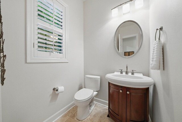 7921 W Rim Dr, Austin, TX 78731 - half bath with vanity and tile patterned flooring
