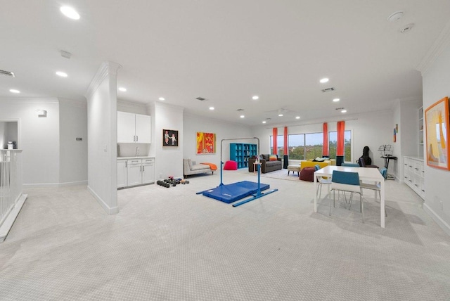 7921 W Rim Dr, Austin, TX 78731 - exercise area featuring ornamental molding, light carpet, and recessed lighting