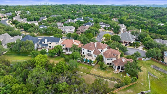 7921 W Rim Dr, Austin, TX 78731 - aerial view of property and surrounding area with nearby suburban area