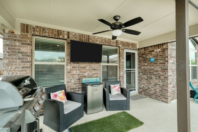 view of patio / terrace featuring a ceiling fan and area for grilling