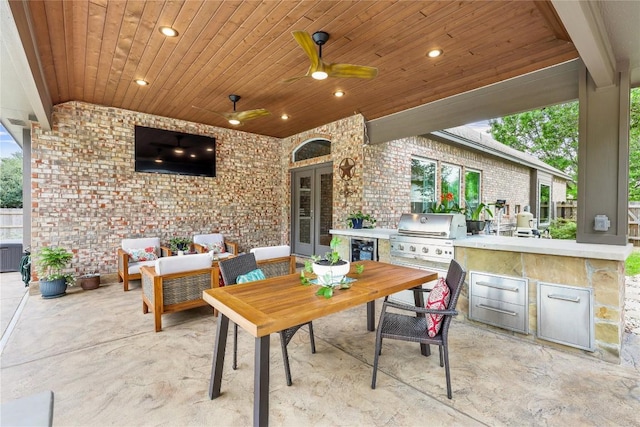 1725 Buttercup Creek Blvd, Cedar Park, TX 78613 - view of patio / terrace with wine cooler, french doors, outdoor dining area, and a ceiling fan
