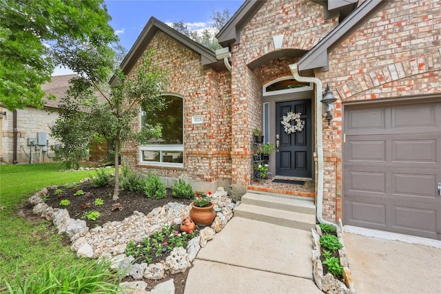 1725 Buttercup Creek Blvd, Cedar Park, TX 78613 - view of exterior entry featuring brick siding and a garage
