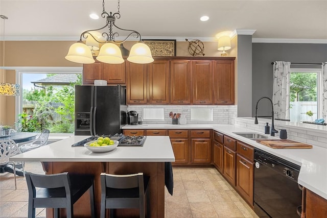 1725 Buttercup Creek Blvd, Cedar Park, TX 78613 - kitchen featuring black appliances, light countertops, a sink, healthy amount of natural light, and crown molding