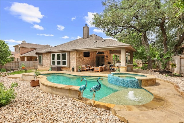 1725 Buttercup Creek Blvd, Cedar Park, TX 78613 - view of pool featuring a fenced backyard, a pool with connected hot tub, a patio area, and outdoor lounge area