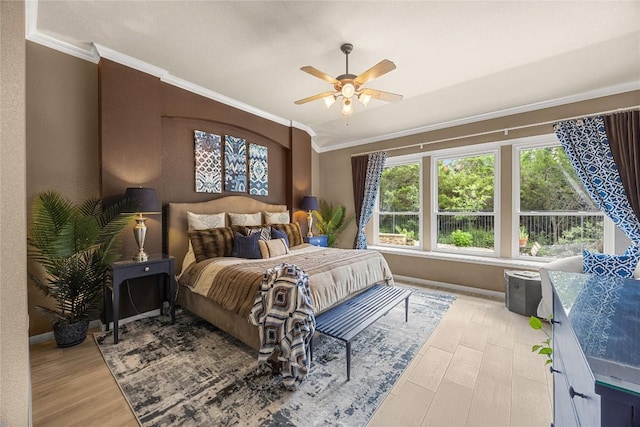 1725 Buttercup Creek Blvd, Cedar Park, TX 78613 - bedroom with ornamental molding, light wood-type flooring, baseboards, and ceiling fan