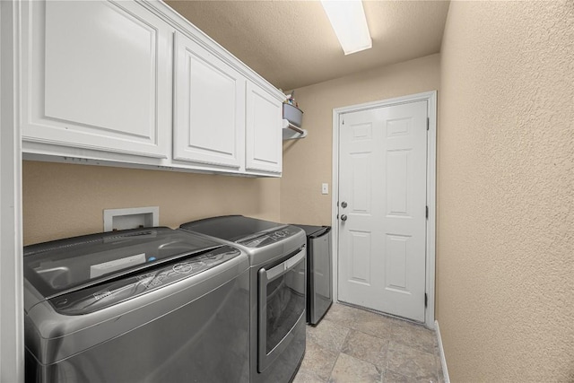 1725 Buttercup Creek Blvd, Cedar Park, TX 78613 - laundry area with cabinet space, independent washer and dryer, a textured wall, and stone finish flooring
