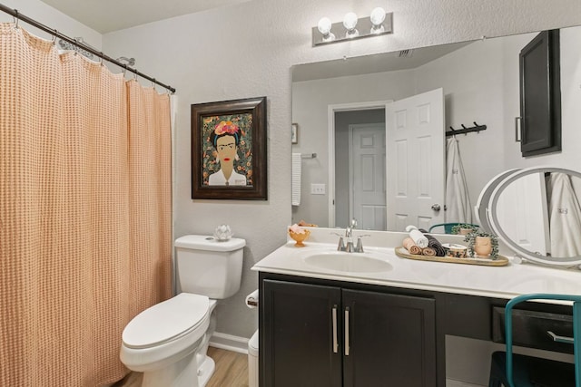 full bathroom with vanity, toilet, baseboards, wood finished floors, and a shower with curtain