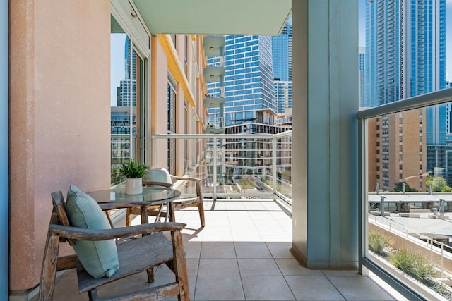 balcony featuring a city view