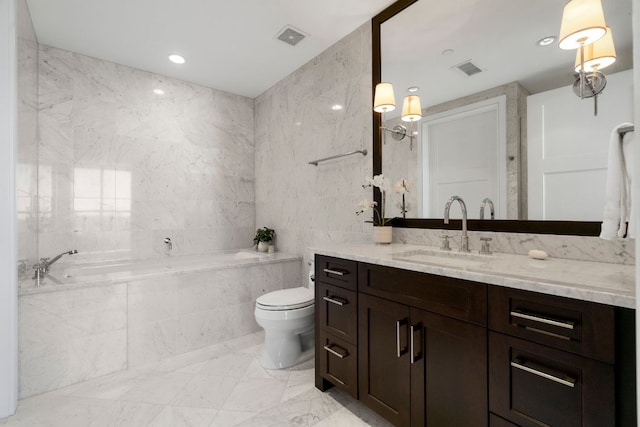 full bathroom featuring visible vents, a bath, toilet, and vanity