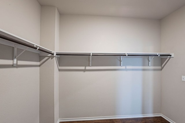 5816 Monmarte Cv, Austin, TX 78744 - spacious closet featuring dark wood-style flooring