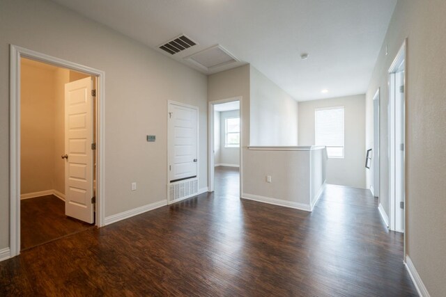 5817 Gerard Dr, Austin, TX 78744 - spare room featuring wood finished floors and baseboards