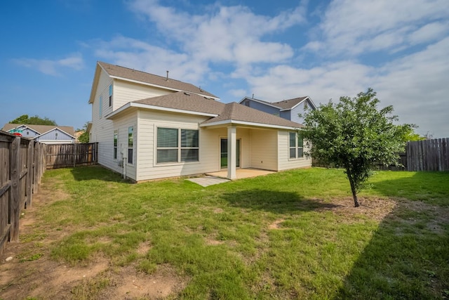 5817 Gerard Dr, Austin, TX 78744 - rear view of property featuring a patio and roof with shingles