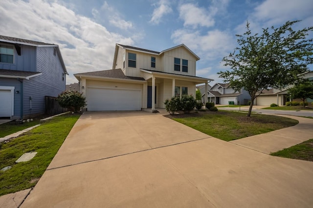 5817 Gerard Dr, Austin, TX 78744 - traditional home with board and batten siding, concrete driveway, and covered porch