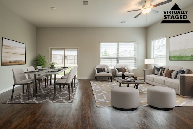 5817 Gerard Dr, Austin, TX 78744 - living room with ceiling fan, wood finished floors, and baseboards