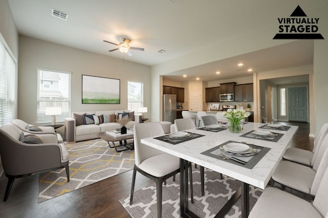 5817 Gerard Dr, Austin, TX 78744 - dining space featuring dark wood-style floors, ceiling fan, and recessed lighting