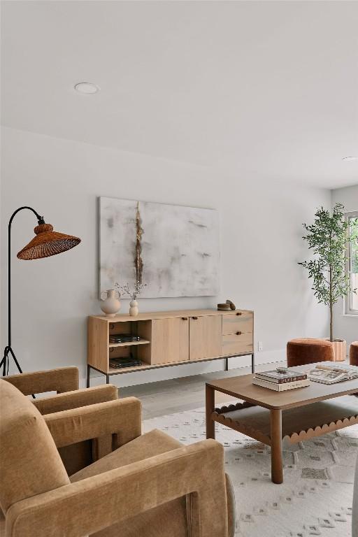 living room featuring recessed lighting and light wood-style flooring