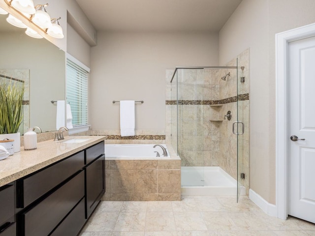 full bathroom with a garden tub, a stall shower, and vanity