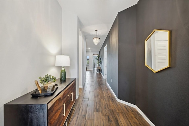 16720 Horondelle Dr, Austin, TX 78738 - hall featuring dark wood-style flooring and baseboards