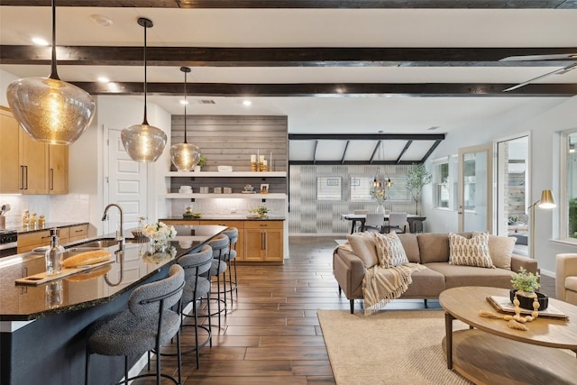 16720 Horondelle Dr, Austin, TX 78738 - living area with beam ceiling and dark wood finished floors