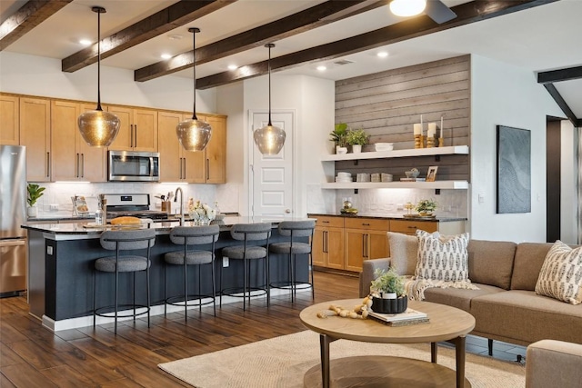 16720 Horondelle Dr, Austin, TX 78738 - kitchen with appliances with stainless steel finishes, tasteful backsplash, dark wood finished floors, beam ceiling, and recessed lighting
