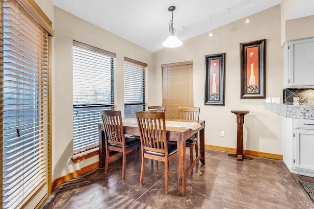 1406 Windsor Rd Unit 305, Austin, TX 78703 - dining space with concrete flooring and baseboards