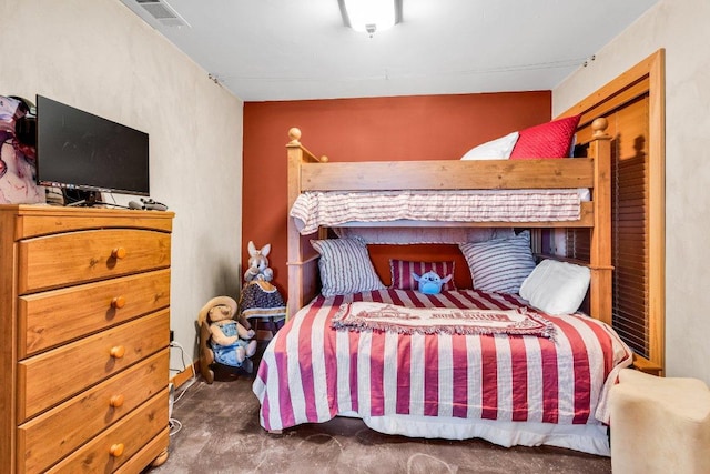 bedroom featuring visible vents