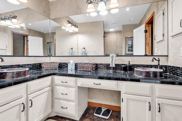 full bathroom featuring double vanity, a sink, and decorative backsplash