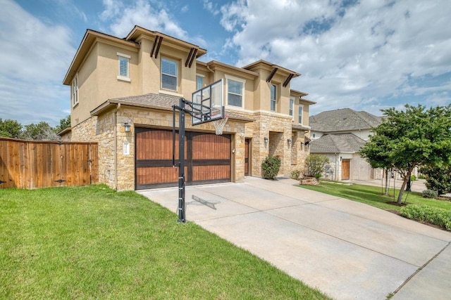 3908 Logan Ridge Dr, Cedar Park, TX 78613 - view of front facade featuring stone siding, concrete driveway, stucco siding, an attached garage, and a gate