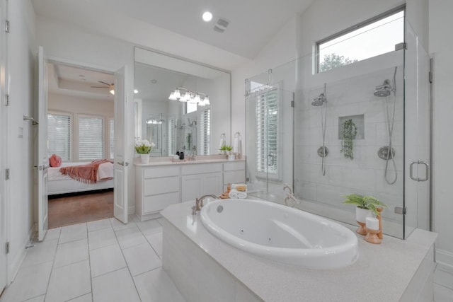 3908 Logan Ridge Dr, Cedar Park, TX 78613 - full bath with a stall shower, ensuite bath, a jetted tub, tile patterned floors, and vanity