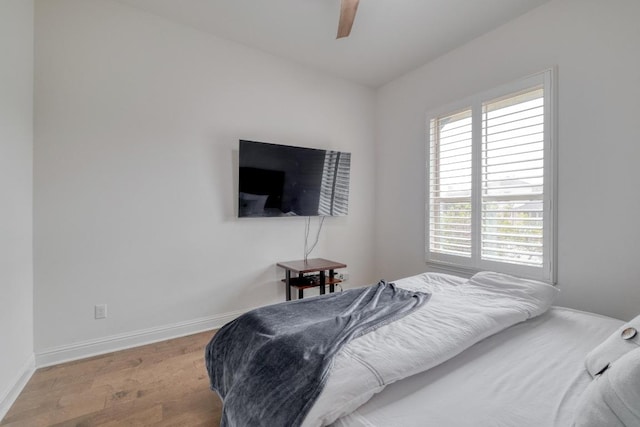 3908 Logan Ridge Dr, Cedar Park, TX 78613 - bedroom with wood finished floors, baseboards, and a ceiling fan