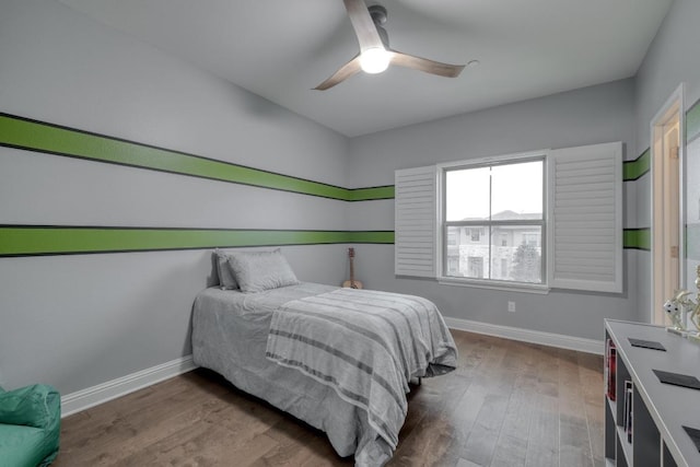 3908 Logan Ridge Dr, Cedar Park, TX 78613 - bedroom with baseboards, wood finished floors, and a ceiling fan