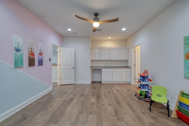 3908 Logan Ridge Dr, Cedar Park, TX 78613 - playroom featuring light wood-style floors, baseboards, recessed lighting, a ceiling fan, and a sink