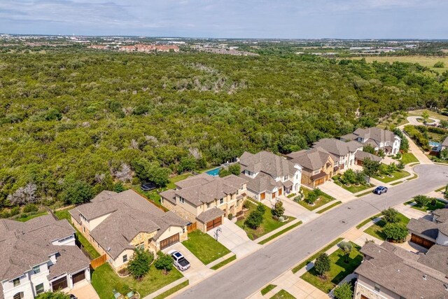 3908 Logan Ridge Dr, Cedar Park, TX 78613 - aerial view of residential area featuring a heavily wooded area
