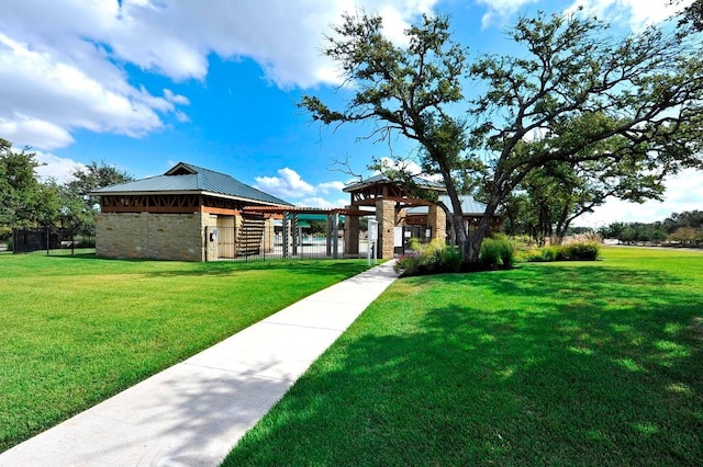 3908 Logan Ridge Dr, Cedar Park, TX 78613 - view of front of home with a gazebo, stone siding, and metal roof