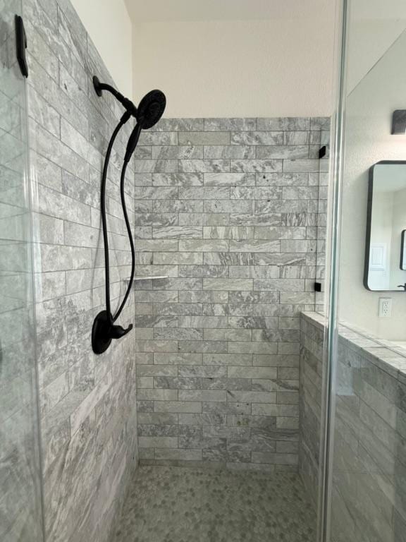 bathroom featuring a stall shower