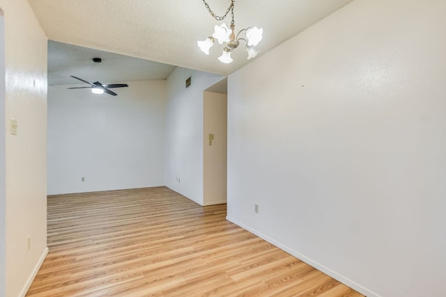 11948 Sunhillow Bnd Unit A & B, Austin, TX 78758 - unfurnished room with light wood-type flooring, a chandelier, and ceiling fan