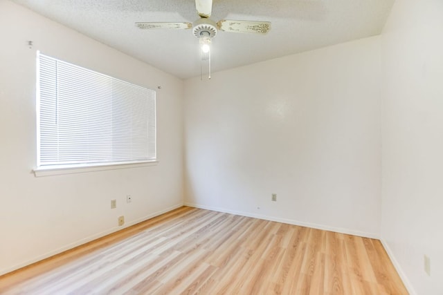 11948 Sunhillow Bnd Unit A & B, Austin, TX 78758 - empty room featuring wood finished floors, baseboards, and a ceiling fan