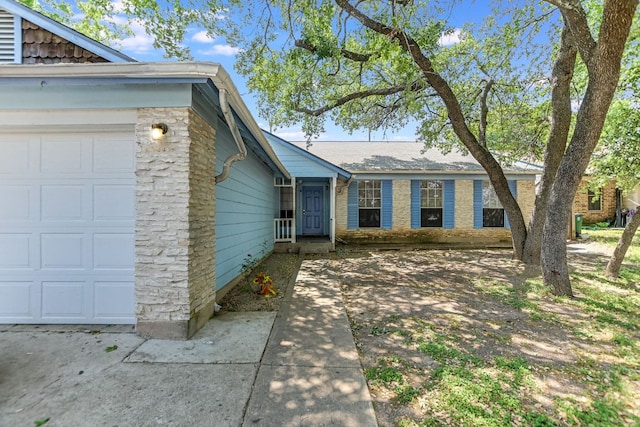 11948 Sunhillow Bnd Unit A & B, Austin, TX 78758 - view of front of house with an attached garage