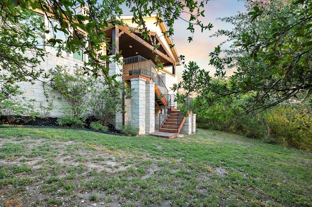 view of yard featuring stairs