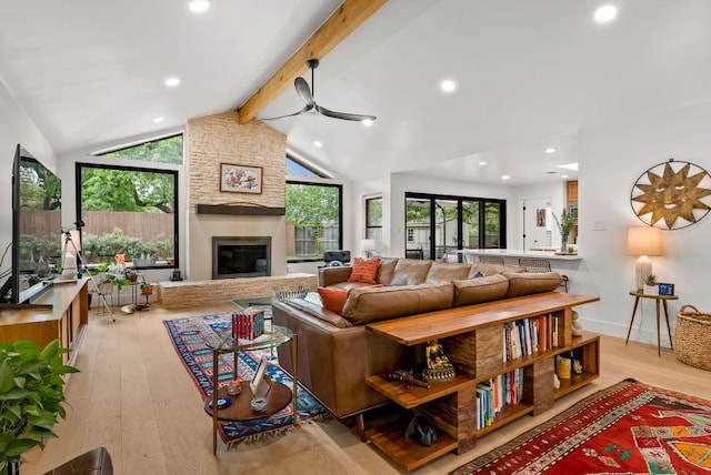 living room featuring ceiling fan, beamed ceiling, recessed lighting, and hardwood / wood-style floors