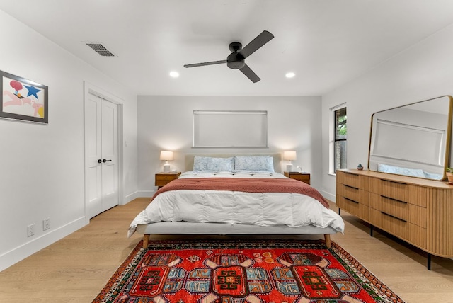 bedroom featuring recessed lighting, baseboards, light wood-type flooring, and visible vents
