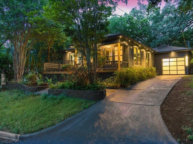 view of front of house with an attached garage and driveway