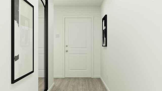 hallway with baseboards and light wood finished floors