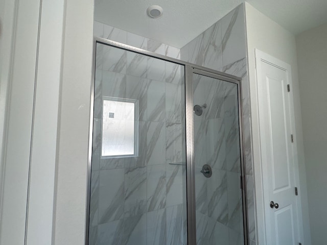 148 Golden Sage Ave, Georgetown, TX 78633 - bathroom with a marble finish shower