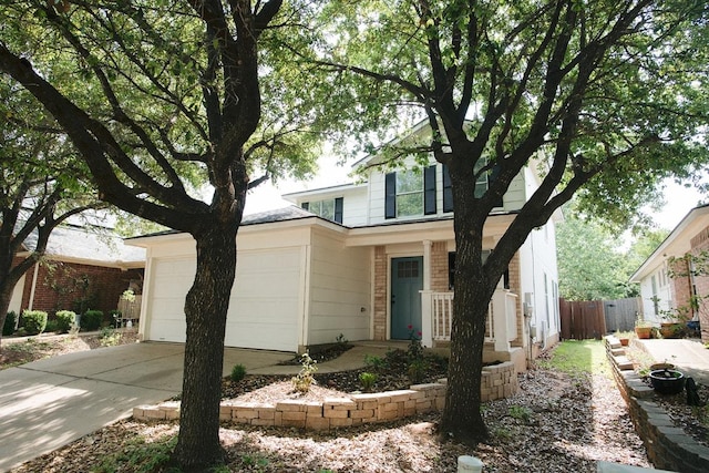 5711 Steven Creek Way, Austin, TX 78721 - traditional home with an attached garage, fence, and driveway