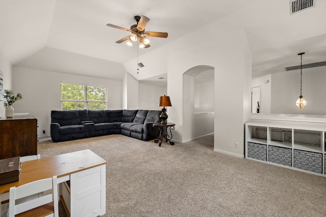 2104 Faldo Ln, Round Rock, TX 78664 - living area with carpet, ceiling fan, arched walkways, vaulted ceiling, and baseboards