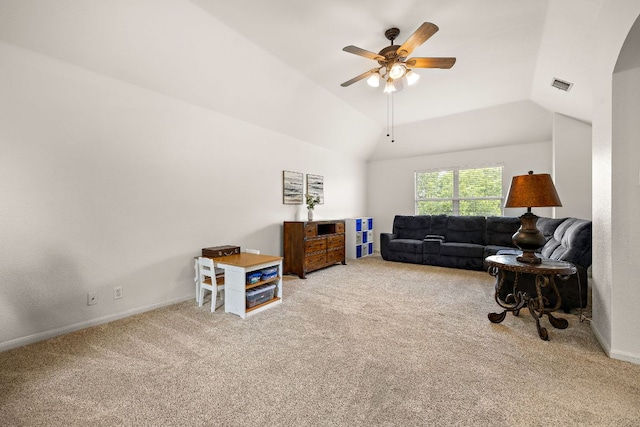 2104 Faldo Ln, Round Rock, TX 78664 - living area featuring carpet, a ceiling fan, vaulted ceiling, and baseboards