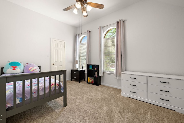 2104 Faldo Ln, Round Rock, TX 78664 - bedroom featuring light carpet, baseboards, and ceiling fan